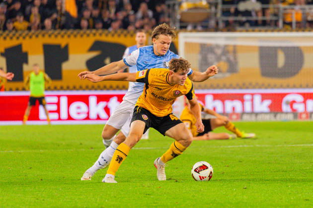 Germany 2. Bundesliga, 2026–2027 Season, September 5, 2026, Matchday 4, SG Dynamo Dresden vs. VfL Bochum, Rudolf Harbig Stadium; Christian Rasmussen (VfL Bochum), 7, in a tackle against Friedrich Müller (SG Dynamo Dresden), 42 Copyright: xMichellexLukax