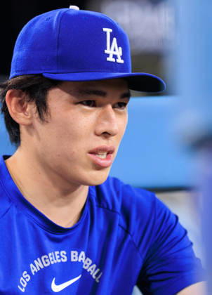 September 8, 2026, Los Angeles, California, USA: Roki Sasaki 11 of the Los Angeles Dodgers watches from the dugout during a regular-season MLB, Baseball Herren, USA game against the Cincinnati Reds on Tuesday September 8, 2026 at Dodger Stadium in Los Angeles, California. Dodgers defeat Reds, 3-2. JAVIER ROJAS PI Los Angeles USA - ZUMAp124 20260908_zaa_p124_021 Copyright: xJavierxRojasx