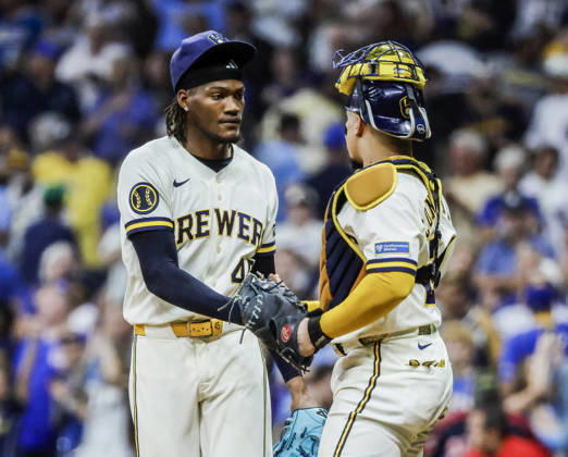 Milwaukee Brewers relief pitcher Abner Uribe celebrates with Milwaukee Brewers catcher William Contreras after the final out in the ninth inning of the MLB, Baseball Herren, USA game between the Chicago Cubs and the Milwaukee Brewers at American Family Field in Milwaukee, Wisconsin on Wednesday, September 9, 2026. The Brewers defeated the Cubs 8-6 to sweep the three game series.  38MIL20260909838 TANNENxMAURY