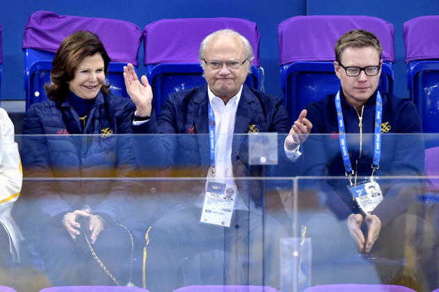 Queen Silvia and King Carl Gustaf cheer from the stands during the ice hockey game between Sweden and Latvia at the Sochi Winter Olympics on February 15, 2014, in Sochi, Russia Copyright: xJoelxMarklundx