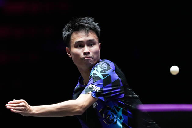 (260911) -- MACAO, Sept. 11, 2026 -- Zhou Qihao hits a return during the men s singles round of 16 match between Zhou Qihao of China and Kanak Jha of the United States at the 2026 World Table tennis, Tischtennis (WTT) Champions Macao in Macao, south China, Sept. 11, 2026. ) (SP)CHINA-MACAO-TABLE TENNIS-WTT-MEN S SINGLES (CN) CheongxKamxKa 