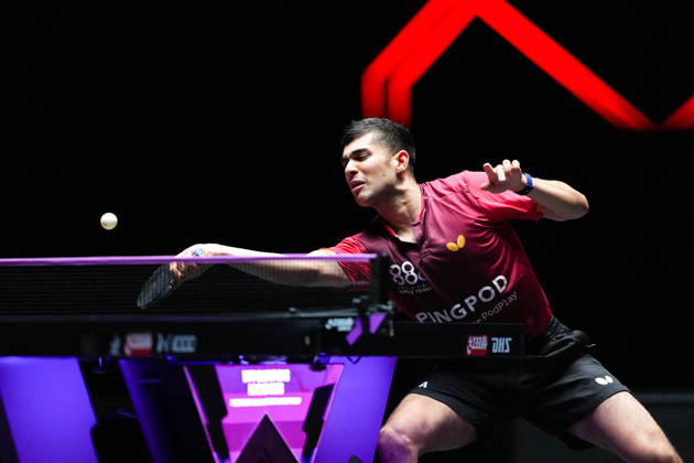 (260911) -- MACAO, Sept. 11, 2026 -- Kanak Jha hits a return during the men s singles round of 16 match between Zhou Qihao of China and Kanak Jha of the United States at the 2026 World Table tennis, Tischtennis (WTT) Champions Macao in Macao, south China, Sept. 11, 2026. ) (SP)CHINA-MACAO-TABLE TENNIS-WTT-MEN S SINGLES (CN) CheongxKamxKa 