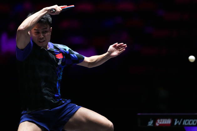 (260911) -- MACAO, Sept. 11, 2026 -- Zhou Qihao hits a return during the men s singles round of 16 match between Zhou Qihao of China and Kanak Jha of the United States at the 2026 World Table tennis, Tischtennis (WTT) Champions Macao in Macao, south China, Sept. 11, 2026. ) (SP)CHINA-MACAO-TABLE TENNIS-WTT-MEN S SINGLES (CN) CheongxKamxKa 