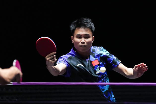 (260911) -- MACAO, Sept. 11, 2026 -- Zhou Qihao hits a return during the men s singles round of 16 match between Zhou Qihao of China and Kanak Jha of the United States at the 2026 World Table tennis, Tischtennis (WTT) Champions Macao in Macao, south China, Sept. 11, 2026. ) (SP)CHINA-MACAO-TABLE TENNIS-WTT-MEN S SINGLES (CN) CheongxKamxKa 
