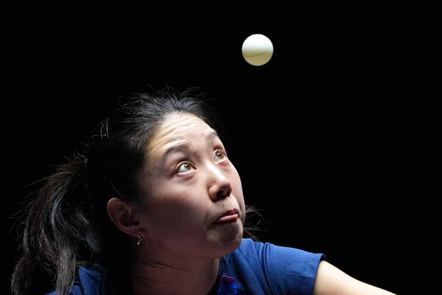 (260911) -- MACAO, Sept. 11, 2026 -- Lili Zhang serves during the women s singles round of 16 match between Dina Meshref of Egypt and Lili Zhang of the United States at the 2026 World Table tennis, Tischtennis (WTT) Champions Macao in Macao, south China, Sept. 11, 2026. ) (SP)CHINA-MACAO-TABLE TENNIS-WTT-WOMEN S SINGLES (CN) CheongxKamxKa 