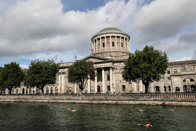 REPRO FREE *PRESS RELEASE NO REPRODUCTION FEE* EDITORIAL USE ONLY 106th Dublin City Liffey Swim 2026, River Liffey, Dublin 12 9 2026 A view of competitors in action outside the Four Courts A view of competitors in action outside the Four Courts 12 9 2026  Copyright: xx RB2_6548