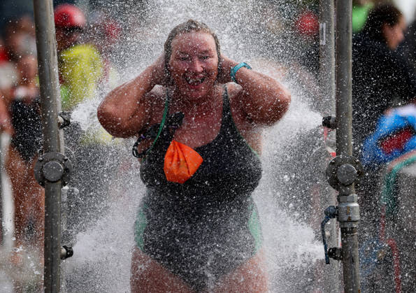 REPRO FREE *PRESS RELEASE NO REPRODUCTION FEE* EDITORIAL USE ONLY 106th Dublin City Liffey Swim 2026, River Liffey, Dublin 12 9 2026 A competitor washes down after the race A competitor washes down after the race 12 9 2026  Copyright: xx RB1_8479
