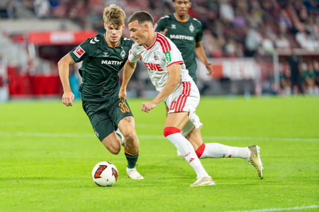Mick Schmetgen of SV Werder Bremen, No. 33, in a tackle with Said El Mala of 1. FC Köln, No. 10; 1. FC Köln vs. SV Werder Bremen, soccer, Bundesliga, Matchday 3, 2026–27 season, September 12, 2026, DFL regulations prohibit any use of photographs as image sequences and or quasi-video, 1. FC Köln vs. SV Werder Bremen, Soccer, Bundesliga, Matchday 3, 2026–27 Season, September 12, 2026, Cologne Copyright: xEibner-Pressefoto LukasxBaldygax EP_LBA