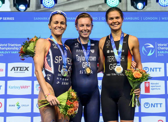 Triathlon World Championship, WM, Weltmeisterschaft races, women, September 13, 2026, Karlovy Vary, Czech Republic. (L-R) Second placed Taylor Spiveyova of USA, winner Georgia Taylor-Brown of Britain and third placed Lisa Tertsch of Germany. (CTKxPhoto OndrejxHajek) CTKPhotoP2026091302702  CTKPhotoP2026091302702