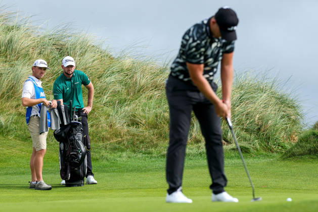 2026 Amgen Irish Open - Fourth Round, Trump International Golf Links, Doonbeg 13 9 2026 Liam Nolan watches on as Matt Wallace putts on the second green Liam Nolan watches on as Matt Wallace putts on the second green 13 9 2026  Copyright: xDanxClohessyx DC1A4474
