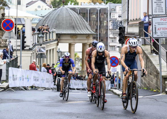 Triathlon World Championship, WM, Weltmeisterschaft races, men, September 13, 2026, Karlovy Vary, Czech Republic. From right Chase McQueen of USA, Connor Bentley of Britain, Mark Devay of Hungary and Dorian Coninx of France. (CTKxPhoto OndrejxHajek) CTKPhotoP2026091304461  CTKPhotoP2026091304461
