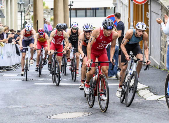 Triathlon World Championship, WM, Weltmeisterschaft races, men, September 13, 2026, Karlovy Vary, Czech Republic. From right Arnaud Mengal of Belgium, Radim Grebik of Czech Republic and Victor Goene of Netherlands. (CTKxPhoto OndrejxHajek) CTKPhotoP2026091304530  CTKPhotoP2026091304530