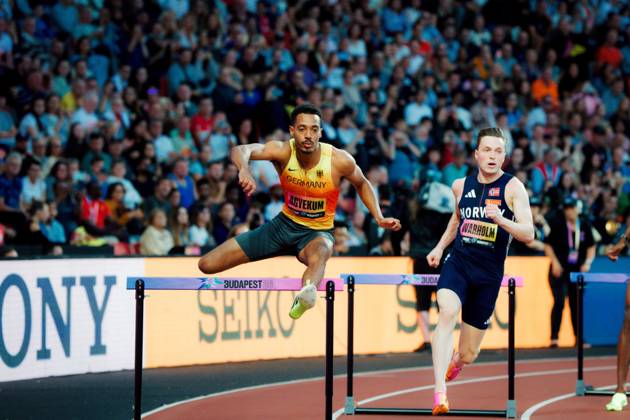 World Athletics Ultimate Championships, Budapest, September 13, 2026: Emil Agyekum (GER, SCC Berlin) and Karsten Warholm (NOR) clear hurdles during a race at the World Athletics Ultimate Championships in Budapest Copyright: xBEAUTIFULxSPORTS Flatemerschx