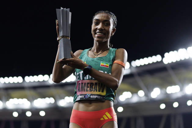 BUDAPEST, HUNGARY - SEPTEMBER 13, 2026:Likina AMEBAW (ETH Ethiopia 5000 Meter) presents the trophy during the World Athletics Ultimate Championship at Gyula Zsivotzky National Athletics Centre on September 13, 2026 in Budapest, Hungary. Hungary Copyright: xAxelxKohringx