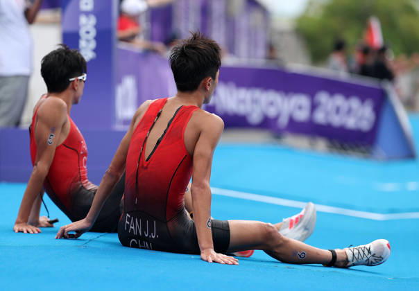 (260920) -- NAGOYA, Sept. 20, 2026 -- Zhang Xirui and Fan Junjie (R) of China react after the men s individual final of triathlon at the 20th Asian Games Aichi-Nagoya 2026 in Gamagori City of Aichi Prefecture, Japan, Sept. 20, 2026. ) (SP)JAPAN-NAGOYA-ASIAN GAMES-TRIATHLON-MEN S INDIVIDUAL DengxHua 