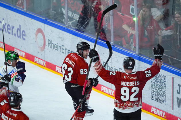 September 25, 2026, xydrx, Ice Hockey, Penny DEL, Kölner Haie vs. Eisbären Berlin, 2026–2027 Season, Lanxess Arena Cologne: Celebration after the goal that tied the game at 5–5 for the Kölner Haie, scored by Patrick Russell (Kölner Haie), 63, alongside Marcel Noebels (Kölner Haie), 92 Copyright: HMBxMedia YannisxDreimann