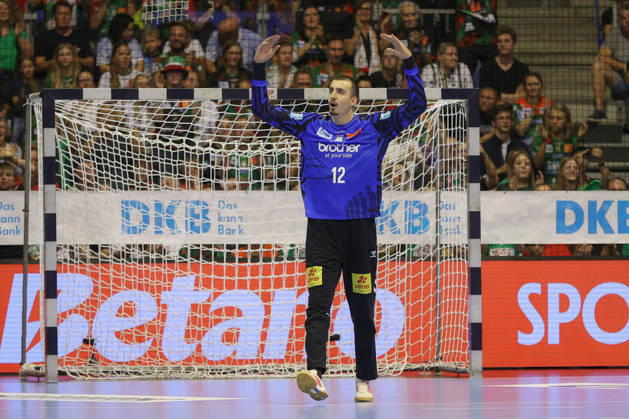 September 30, 2026, xgox, Opel HBL Handball, SC Magdeburg vs. THW Kiel, emspor, from left: Matej Mandic (Magdeburg), 12 celebrating a saved shot, blocked, saved, Magdeburg goalkeeper