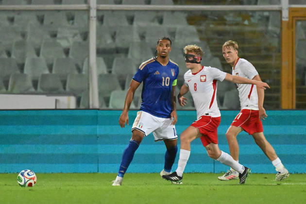 Kowalczyk Poland on Ndour Italy during the U21, U 21 European Qualifiers match between Italia and Polonia at the stadio Adriatico ˜Giovanni Cornacchia™in Pescara . Monday, October 05, 2026. - Soccer  Copyright: xFabioxUrbini LaPressex