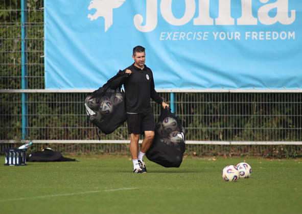 Soccer, Men s, Bavarian Regional League, 2026–2027 Season, TSV 1860 Munich, Practice, Grünwalder Strasse 114, Alper Kayabunar, coach of TSV 1860 Munich, walking across the practice field carrying two soccer nets