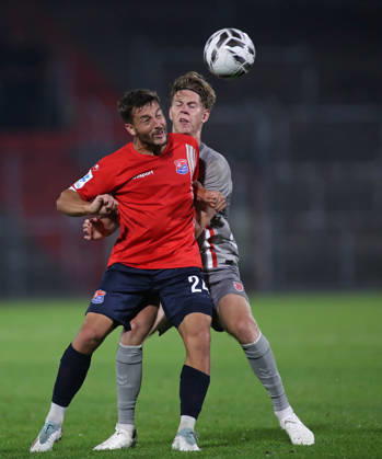 Soccer, Men s, Toto Cup, Quarterfinals, 2026–2027 Season, SpVgg Unterhaching vs. SSV Jahn Regensburg, Sportpark Unterhaching: Moritz Müller (SpVgg Unterhaching, left) and Leopold Wurm (SSV Jahn Regensburg, right) battle for the ball