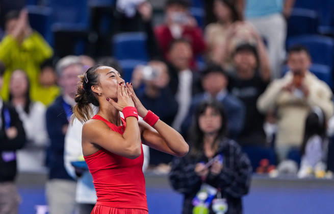 (261007) -- BEIJING, Oct. 7, 2026 -- Zheng Qinwen of China celebrates after winning the women s singles fourth round match between Zheng Qinwen of China and Alina Charaeva of Armenia at 2026 China Open tennis tournament in Beijing, China, Oct. 7, 2026. ) (SP)CHINA-BEIJING-TENNIS-CHINA OPEN-WOMEN S SINGLES (CN) SunxFei