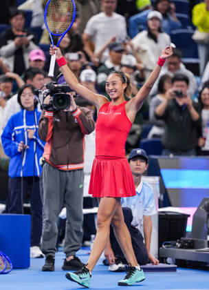 (261007) -- BEIJING, Oct. 7, 2026 -- Zheng Qinwen of China celebrates after winning the women s singles fourth round match between Zheng Qinwen of China and Alina Charaeva of Armenia at 2026 China Open tennis tournament in Beijing, China, Oct. 7, 2026. ) (SP)CHINA-BEIJING-TENNIS-CHINA OPEN-WOMEN S SINGLES (CN) SunxFei