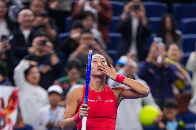 (261007) -- BEIJING, Oct. 7, 2026 -- Zheng Qinwen of China celebrates after winning the women s singles fourth round match between Zheng Qinwen of China and Alina Charaeva of Armenia at 2026 China Open tennis tournament in Beijing, China, Oct. 7, 2026. ) (SP)CHINA-BEIJING-TENNIS-CHINA OPEN-WOMEN S SINGLES (CN) SunxFei