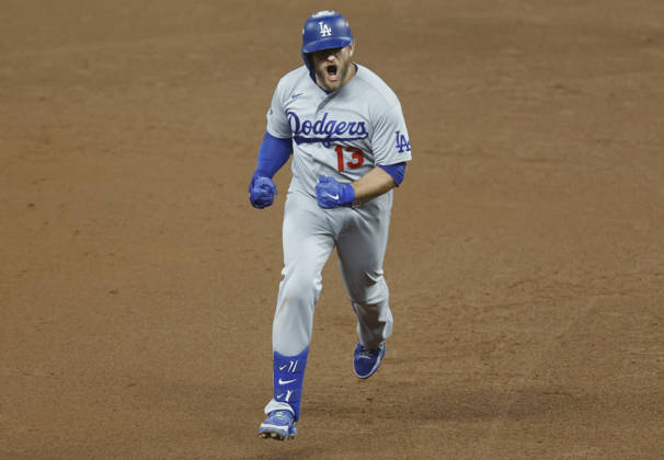 Los Angeles Dodgers Max Muncy (13) runs the bases after hitting a solo home run in the ninth inning against the Atlanta Braves in an MLB, Baseball Herren, USA National League Division Series playoff game at Truist Park in Atlanta, Georgia, on Wednesday, October 7, 2026. The Dodgers defeated the Braves 4-1 to win the series 3 games to 1 and advance to the Championship round.  ATL20261007724 MIKExZARRILLI