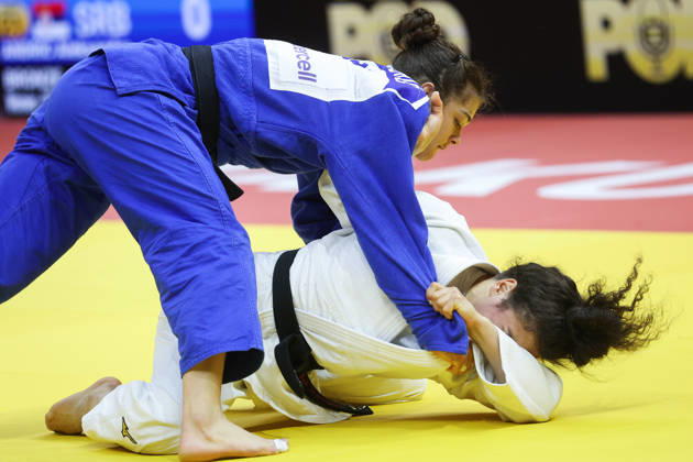 AZERBAIJAN, BAKU - OCTOBER 8, 2026: Madina Taimazova (bottom) of Russia and Aleksandra Andric of Serbia compete in their -70 kg bout as part of the 2026 World Judo Championships at the National Gymnastics Arena. Mikhail Sinitsyn TASS  98954773