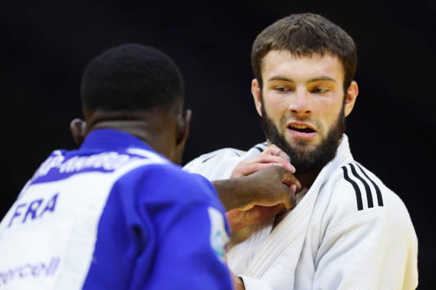 AZERBAIJAN, BAKU - OCTOBER 8, 2026: Maxime-Gael Ngayap Hambou (L) of France and Boris Rutovic of Serbia compete in their -90 kg bout as part of the 2026 World Judo Championships at the National Gymnastics Arena. Mikhail Sinitsyn TASS 98958547