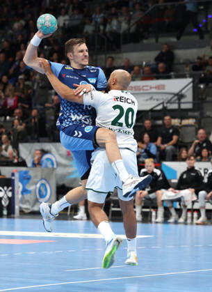 October 8, 2026, Stuttgart, Germany: TVB Stuttgart vs. HSG Wetzlar handball game; from left: Simone Mengon (TVB), David Cyrill Akakpo (Wetzlar)