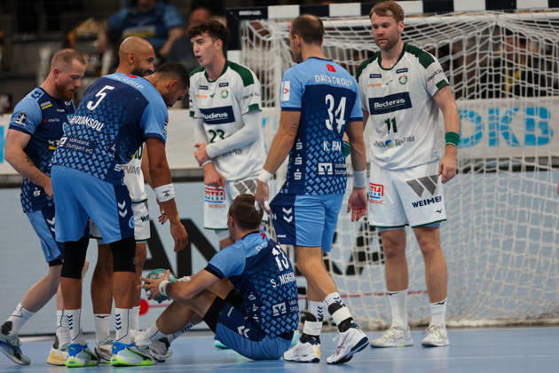 Simone Mengon of TVB Stuttgart, No. 15, is on the floor after a foul. GER, TVB Stuttgart vs. HSG Wetzlar, Handball, Opel Handball Bundesliga, Matchday 8, 2026–2027 season, October 8, 2026, GER, TVB Stuttgart vs. HSG Wetzlar, Handball, Opel Handball Bundesliga, Matchday 8, 2026–2027 season, October 8, 2026, Stuttgart Copyright: xEibner-Pressefoto SoerenxHerwegx EP_SHG