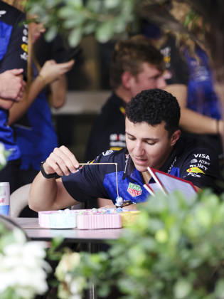 October 8, 2026, Singapore, Kaohsiung City, Singapore: ISACK HADJAR of Oracle Red Bull Racing enjoys a light-hearted moment playing a fishing game in the team s hospitality area in the paddock ahead of the 2026 Formula 1 Singapore Grand Prix at Marina Bay Street Circuit in Singapore. Singapore Singapore - ZUMAh201 20261008_zsp_h201_023 Copyright: xYichinxHoux