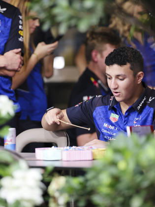 October 8, 2026, Singapore, Kaohsiung City, Singapore: ISACK HADJAR of Oracle Red Bull Racing enjoys a light-hearted moment playing a fishing game in the team s hospitality area in the paddock ahead of the 2026 Formula 1 Singapore Grand Prix at Marina Bay Street Circuit in Singapore. Singapore Singapore - ZUMAh201 20261008_zsp_h201_024 Copyright: xYichinxHoux