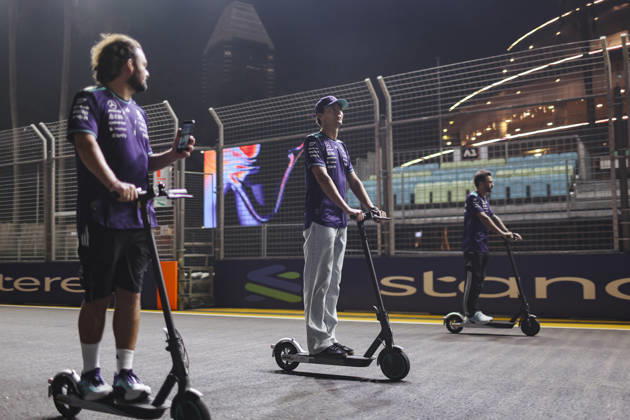 October 8, 2026, Singapore, Kaohsiung City, Singapore: GEORGE RUSSELL of Mercedes-AMG Petronas Formula One Team rides an electric scooter through the paddock and poses for photographers ahead of the 2026 Formula 1 Singapore Grand Prix at Marina Bay Street Circuit in Singapore. Singapore Singapore - ZUMAh201 20261008_zsp_h201_038 Copyright: xYichinxHoux