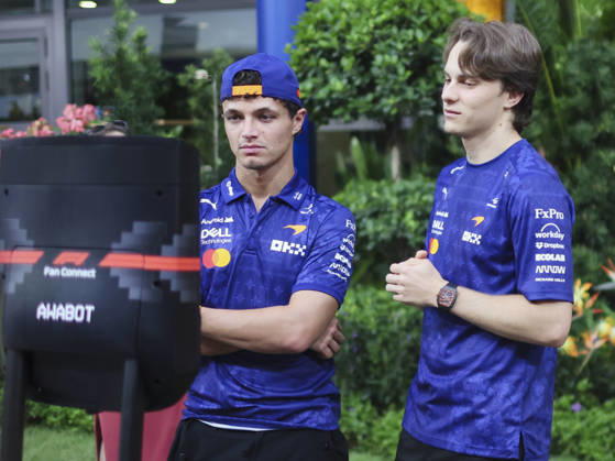 October 8, 2026, Singapore, Kaohsiung City, Singapore: LANDO NORRIS and OSCAR PIASTRI of McLaren Mastercard F1 Team interact with children during a video call in the team s hospitality area in the paddock ahead of the 2026 Formula 1 Singapore Grand Prix at Marina Bay Street Circuit in Singapore. Singapore Singapore - ZUMAh201 20261008_zsp_h201_035 Copyright: xYichinxHoux