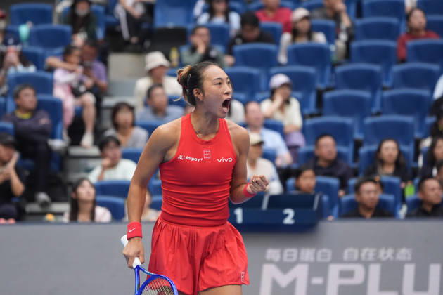 (261009) -- BEIJING, Oct. 9, 2026 -- Zheng Qinwen of China celebrates scoring during the women s singles quarterfinal match between Zheng Qinwen of China and Elina Svitolina of Ukraine at 2026 China Open tennis tournament in Beijing, China, Oct. 9, 2026. ) (SP)CHINA-BEIJING-TENNIS-CHINA OPEN-WOMEN S SINGLES (CN) XiexHan