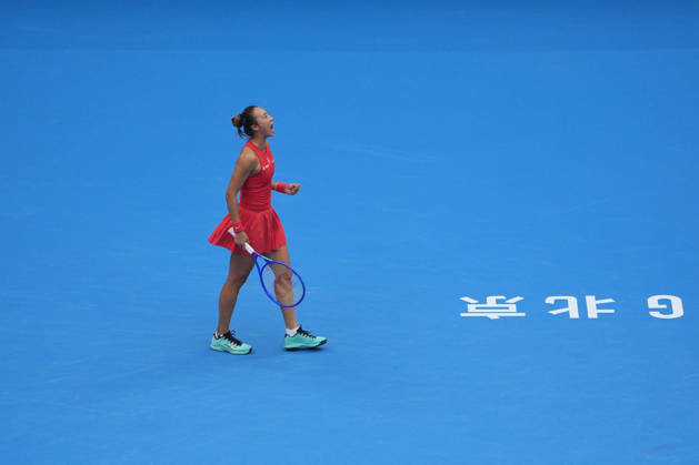 (261009) -- BEIJING, Oct. 9, 2026 -- Zheng Qinwen of China celebrates scoring during the women s singles quarterfinal match between Zheng Qinwen of China and Elina Svitolina of Ukraine at 2026 China Open tennis tournament in Beijing, China, Oct. 9, 2026. ) (SP)CHINA-BEIJING-TENNIS-CHINA OPEN-WOMEN S SINGLES (CN) XiexHan