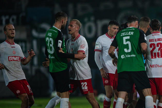 October 9, 2026, 3rd Division, Matchday 8, SC Preußen Münster vs. Rot Weiss Essen at the LVM Preußenstadion; fan groups from Münster and Essen; Janne Sietan (Essen) vs. Felix Higl (Münster) IMPORTANT NOTICE: In accordance with DFB and DFL regulations, it is prohibited to use or allow the use of photographs taken in the stadium and or during the game in the form of sequential images and or video-like photo series Copyright: xJordyxFourgonx