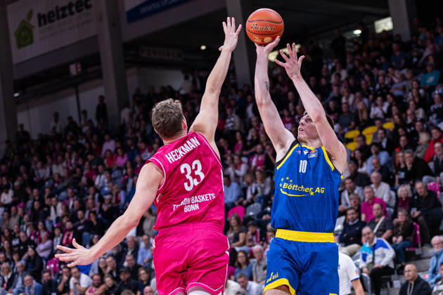 easyCredit Basketball Bundesliga, Telekom Baskets Bonn vs. Science City Jena, October 9, 2026 Christian Skladanowski Science City Jena 10 over Patrick Heckmann Telekom Baskets Bonn 33 easyCredit Basketball Bundesliga, Telekom Baskets Bonn vs. Science City Jena, October 9, 2026, Telekom Dome Bonn Copyright: xBEAUTIFULxSPORTS Derixx