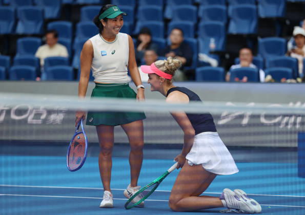 (261010) -- BEIJING, Oct. 10, 2026 -- Erin Routliffe (R) Aldila Sutjiadi react during the women s doubles semifinal match between Katerina Siniakova (the Czech Republic) Zhang Shuai (China) and Erin Routliffe (New Zealand) Aldila Sutjiadi (Indonesia) at 2026 China Open tennis tournament in Beijing, China, Oct. 10, 2026. ) (SP)CHINA-BEIJING-TENNIS-CHINA OPEN-WOMEN S DOUBLES (CN) ZhangxChenlin 