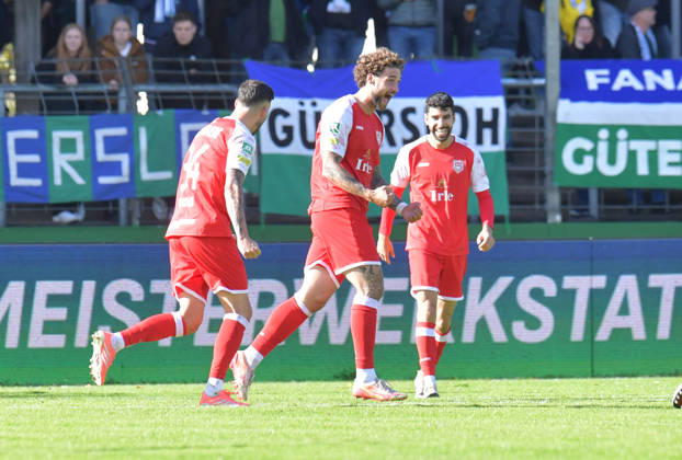 October 10, 2026, GER, Soccer, Regionalliga West, 2026–2027 Season, Matchday 12, Ohlendorf Stadium in Heidewald, Gütersloh FC vs. SF Siegen 0–5, Goal celebration: SF Siegen goal scorer Jan Luca Rumpf, SF Siegen, Action, Single frame, Landscape orientation, Facial expressions, Gestures, Celebration, Cheering, Joy, Happiness