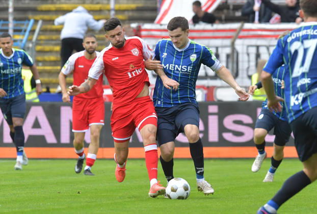 October 10, 2026, GER, Soccer, Regionalliga West, 2026–2027 Season, Matchday 12, Ohlendorf Stadium in Heidewald, Gütersloh FC vs. SF Siegen 0–5, Björn Rother (FC Gütersloh, right) vs. Dennis Brock (SF Siegen), action, duel, tackle