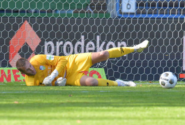 October 10, 2026, GER, Soccer, Regionalliga West, 2026–2027 Season, Matchday 12, Ohlendorf Stadium in Heidewald, Gütersloh FC vs. SF Siegen 0–5 Jarno Peters of FC Gütersloh saves a penalty kick, action, still image, horizontal, goalkeeper, keeper, save
