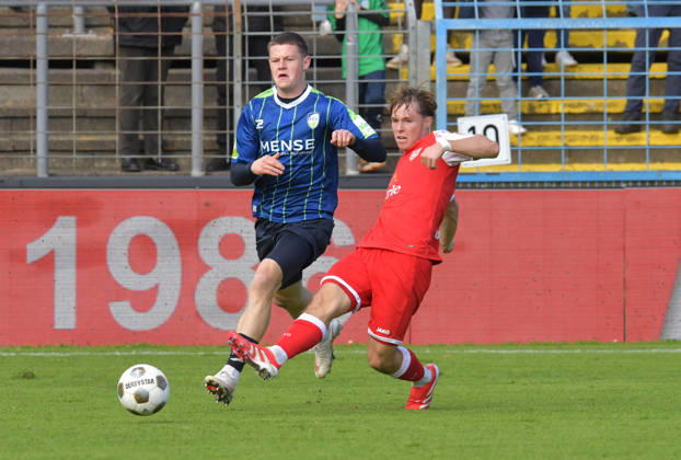 October 10, 2026, GER, Soccer, Regionalliga West, 2026–2027 Season, Matchday 12, Ohlendorf Stadium in Heidewald, Gütersloh FC vs. SF Siegen 0–5, Justin Lukas (FC Gütersloh, left) vs. Konstantin Gerhardt (SF Siegen), action, duel, tackle
