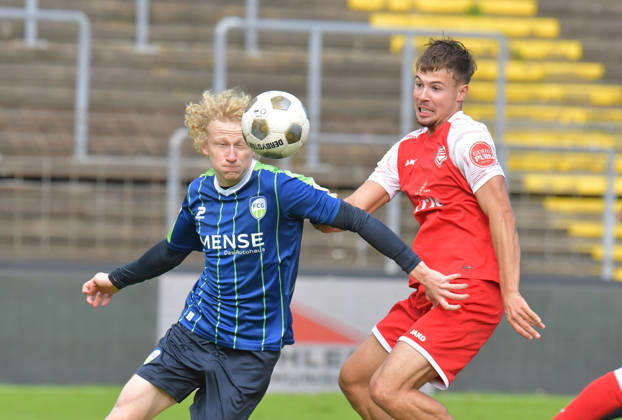 October 10, 2026, GER, Soccer, Regionalliga West, 2026–2027 Season, Matchday 12, Ohlendorf Stadium in Heidewald, Gütersloh FC vs. SF Siegen 0–5, Niklas Frese (FC Gütersloh, left) vs. Tim Arnold (SF Siegen), action, duel, tackle