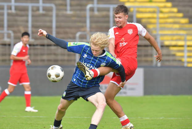 October 10, 2026, GER, Soccer, Regionalliga West, 2026–2027 Season, Matchday 12, Ohlendorf Stadium in Heidewald, Gütersloh FC vs. SF Siegen 0–5, Niklas Frese (FC Gütersloh, left) vs. Tim Arnold (SF Siegen), action, duel, tackle