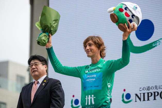 Tour De Kyushu Stage Finishes In Fukuoka s Tenjin For The First Time Matteo Malucelli of XDS Astana Team wins Stage 1 of the Mynavi Tour de Kyushu 2026 at the finish line on Tenjin Bridge in Fukuoka, Japan, on October 10, 2026. The Italian won the 152.0-kilometer Saga-Fukuoka stage in 3 hours 9 minutes 51 seconds, ahead of Luke Mudgway (Li Ning Star) and Alessio Delle Vedove (XDS Astana Team), and took the general and points classification leads. It was the first time the race finished in Tenjin, the commercial heart of Fukuoka, where a parade, stage events and food stalls marked the day. The race, first held in 2023 and part of the UCI Asia Tour (2.1 category), runs October 9-12 through six Kyushu prefectures under the official title We stand with Kumamoto. Mynavi Tour de Kyushu 2026, adopted to support areas affected by the Kumamoto earthquake. Fukuoka Japan  Copyright: xRyoxChix originalFilename:zhi-tourdeky261010_np6um.jpg
