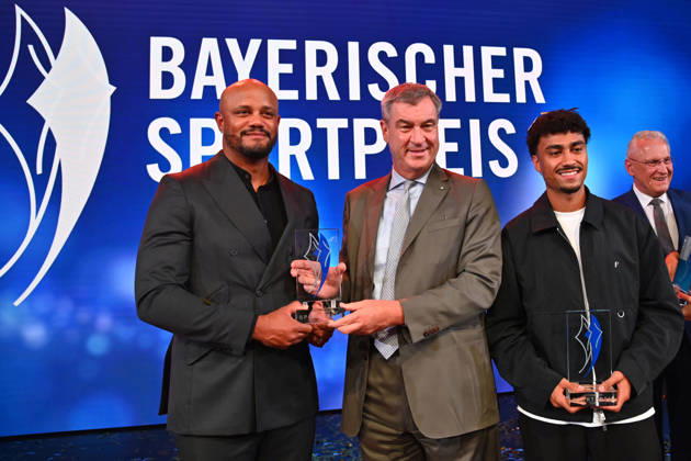 Coach Vincent KOMPANY of Bayern Munich with the Honorary Award from Bavarian Minister-President Markus SOEDER, Nathaniel BROWN of Bayern Munich, and Joachim HERRMANN, Bavarian Minister of the Interior, at the 2026 Bavarian Sports Award ceremony at BMW Welt, Red Carpet on October 10, 2026