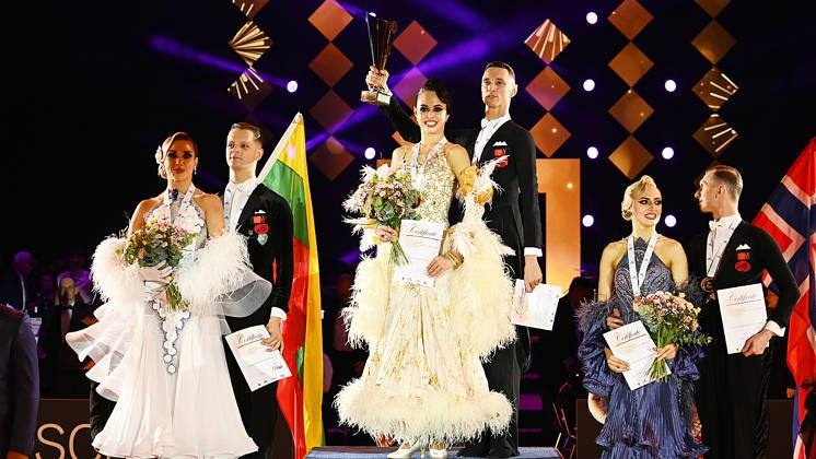 2026 World Standard Dance Championships in Leipzig, WDSF World Championships, October 10, 2026. Winners podium at the World Dance Championships in Leipzig, October 10, 2026. Gold: Vadim Shurin and Anastasia Meshkova from Latvia (center), Silver: Edgaras Baltaragis and Indre Baltarage from Lithuania (left), Bronze: Jonas Alexander Pettersen and Kristy Puusepp from Norway, Leipzig, Saxony, Germany, Leipzig Exhibition Center, Neue Messe Leipzig